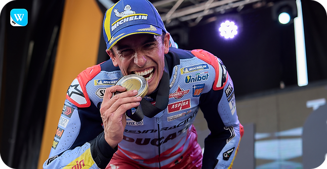 Marc Marquez bite his medal